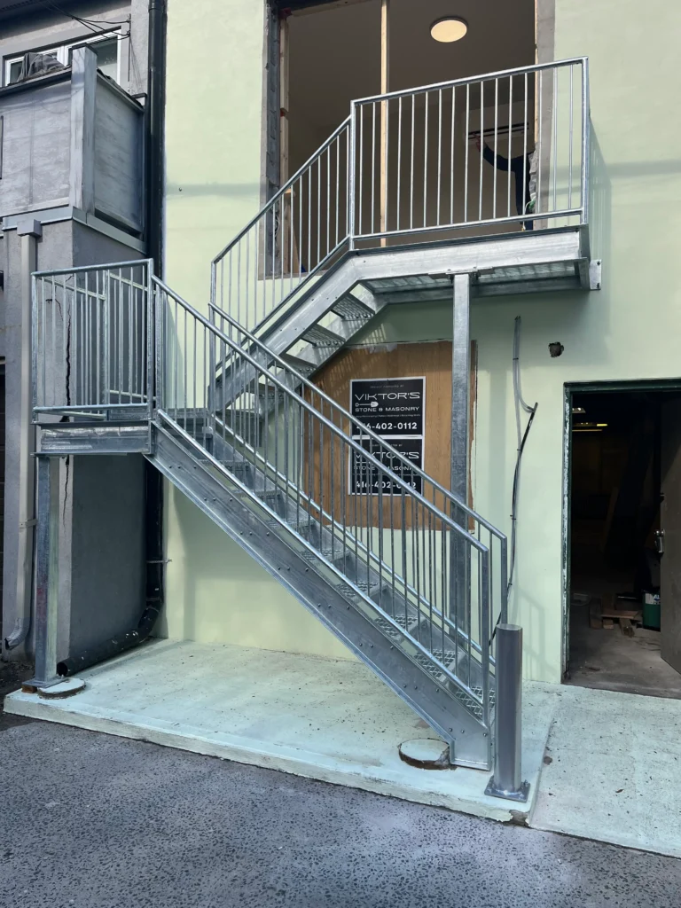 Custom iron railings for exterior staircase
