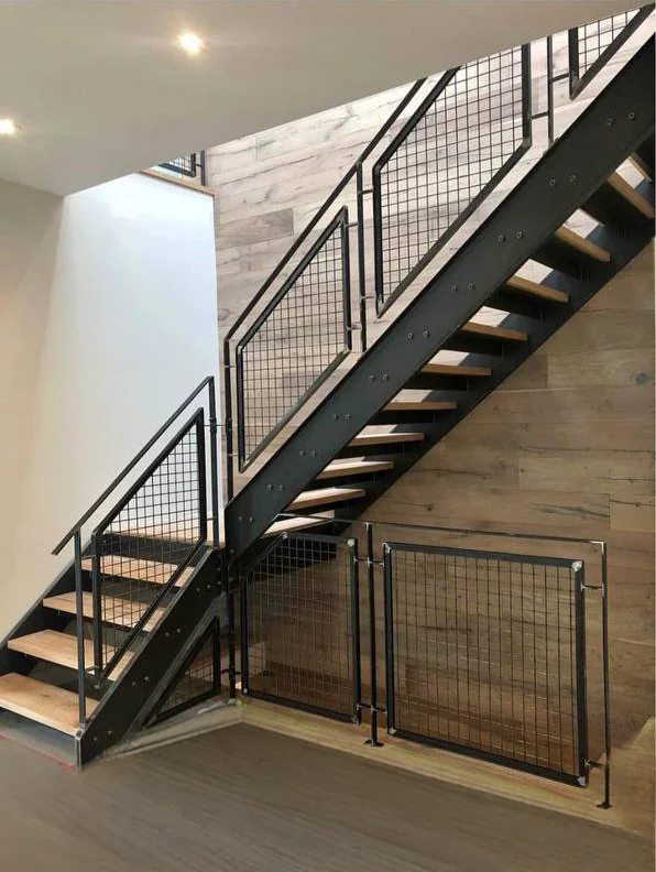 Custom double-stringer stairs with modern metal railing